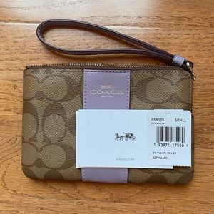 NWT Coach Wristlet with purple accent